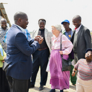 county commissioner and mama Ingrid Monroe having a chat with site staff